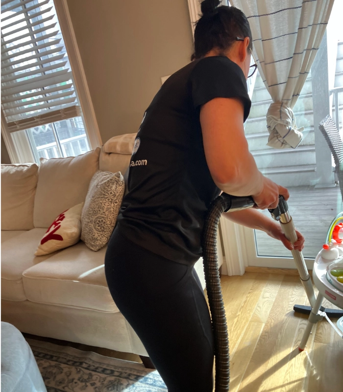 Professional house cleaners from Crystal Cleaning Services in a Boston area home